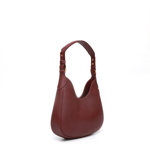 Mini Cloe, borsa da spalla in morbida pelle martellata mosto, design a sacca con accessori metallici color oro,firmata Pianigiani Bags
