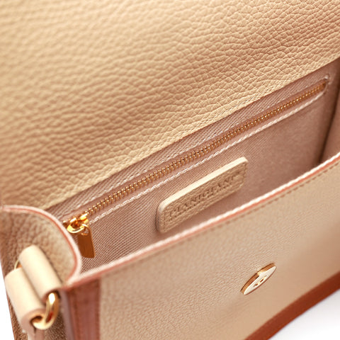 Cara in pelle beige e cuoio