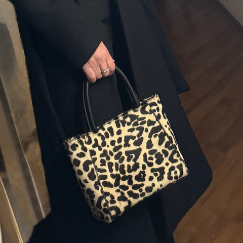 Charlotte piccola, borsa in pelle maculata con lacci a mano e tracolla removibile, prodotta da Pianigiani Bags.