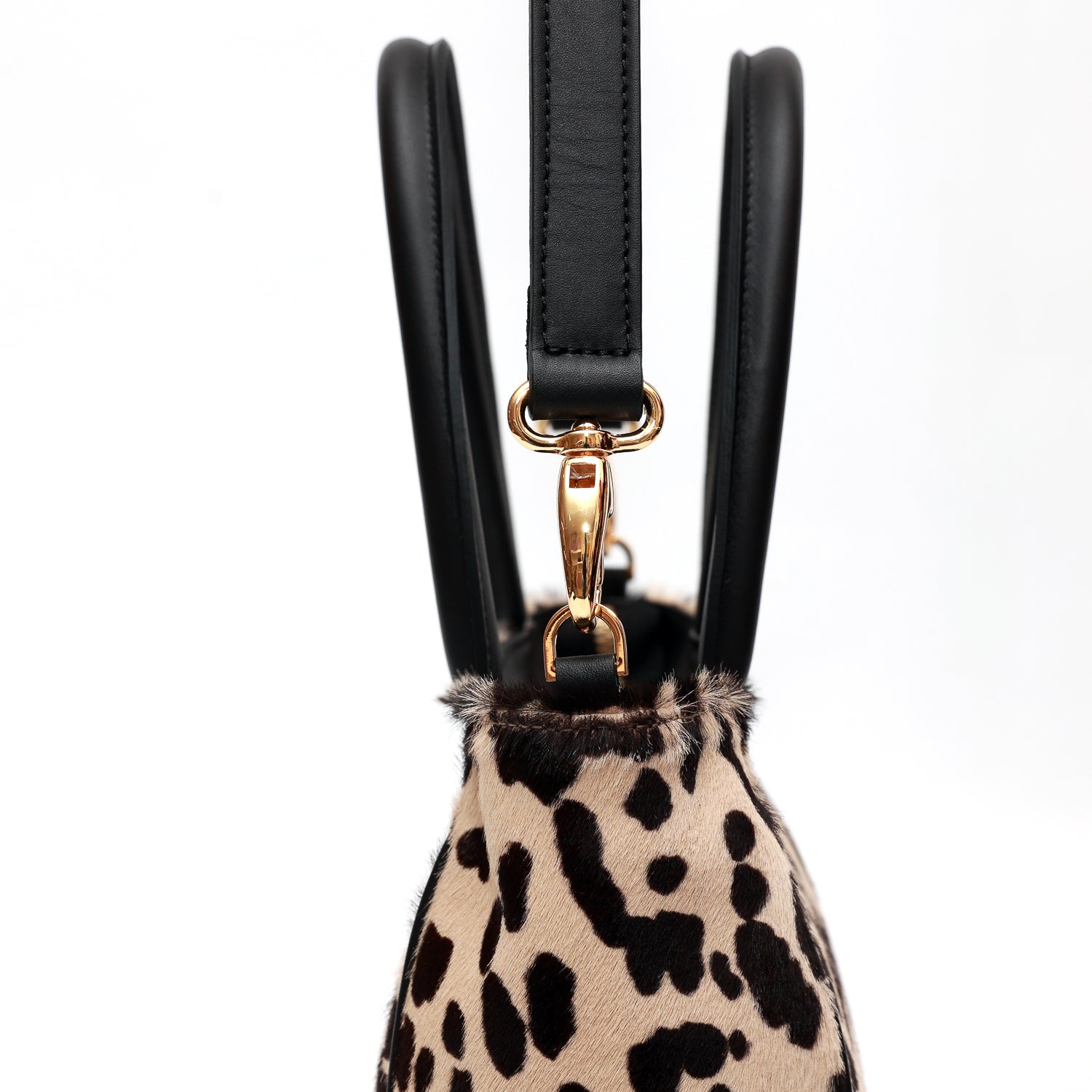 Charlotte piccola, borsa in pelle maculata con lacci a mano e tracolla removibile, prodotta da Pianigiani Bags.