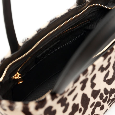 Charlotte piccola, borsa in pelle maculata con lacci a mano e tracolla removibile, prodotta da Pianigiani Bags.