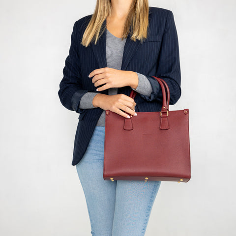 Small Lady in burgundy leather