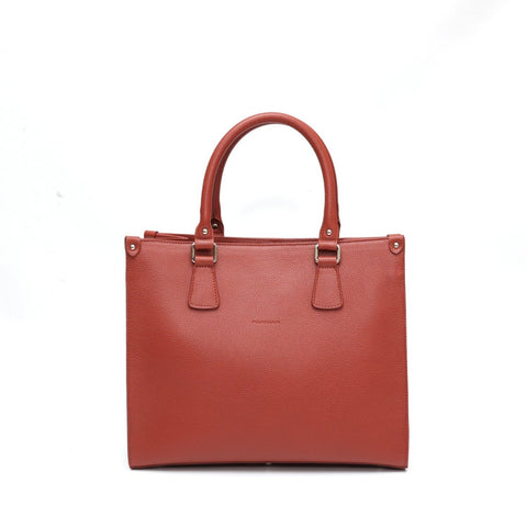 Lady bag S, borsa da donna a mano con tracolla in pelle martellata ruggine, realizzata da Pianigiani Bags.