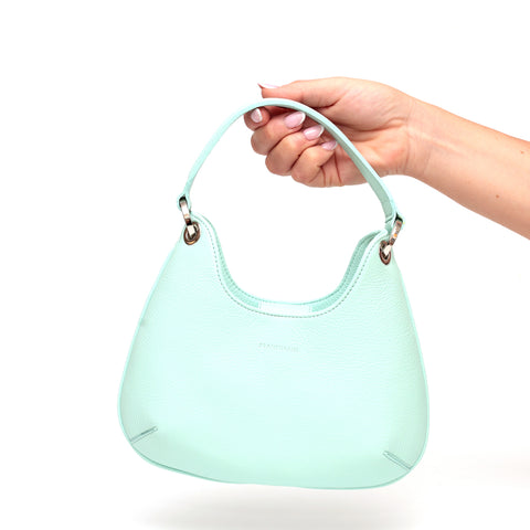 Mini Lou, borsa compatta da donna a tracolla, realizzata in pelle martellata acquamarina, con lavorazione artigianale firmata Pianigiani Bags