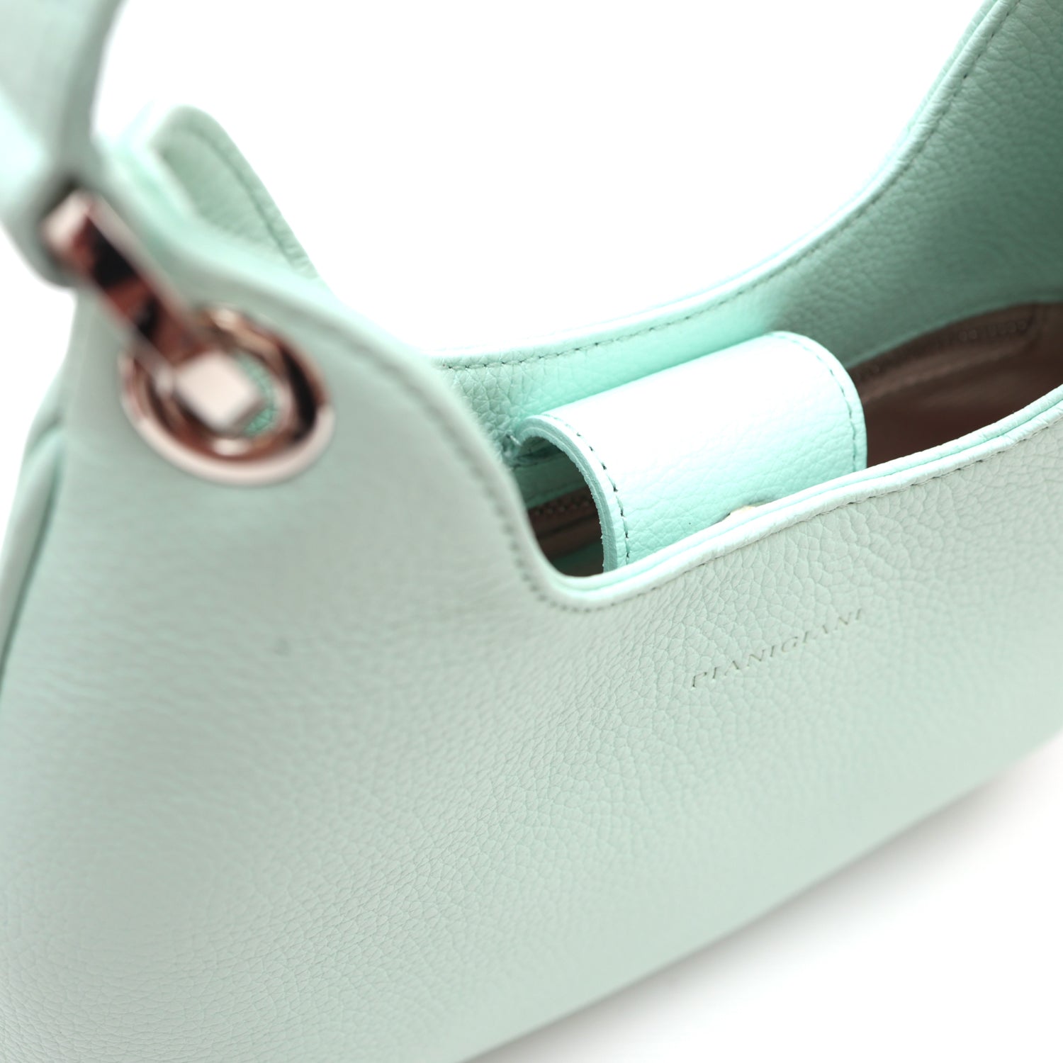 Mini Lou, borsa compatta da donna a tracolla, realizzata in pelle martellata acquamarina, con lavorazione artigianale firmata Pianigiani Bags