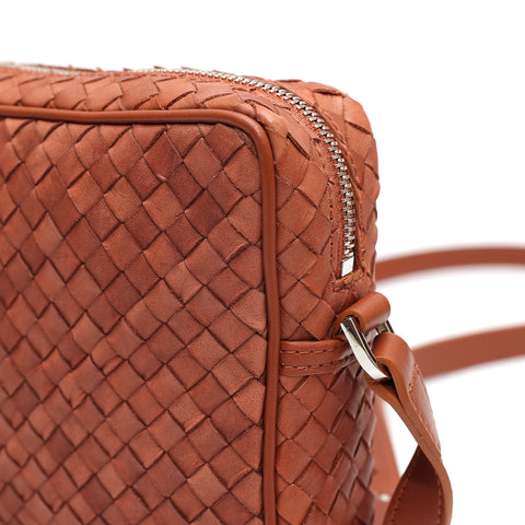 Miss small in brown leather