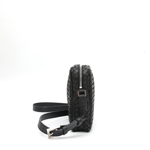 Miss large in black leather
