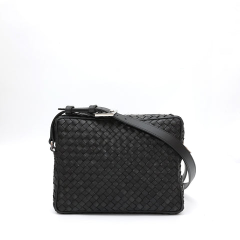 Miss large in black leather