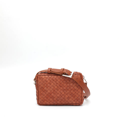 Miss small in brown leather