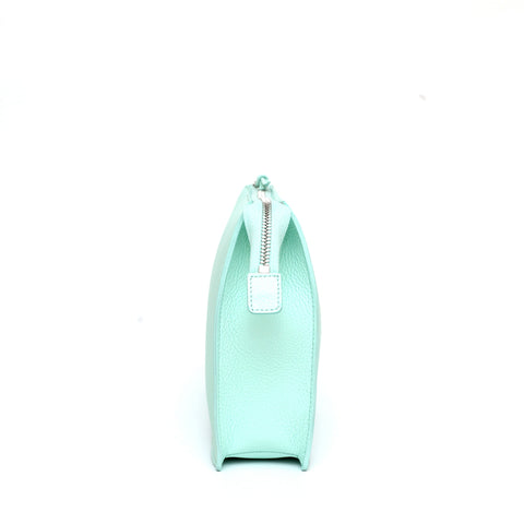 Large pocket in aquamarine leather