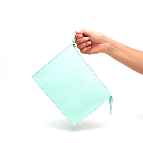 Large pocket in aquamarine leather