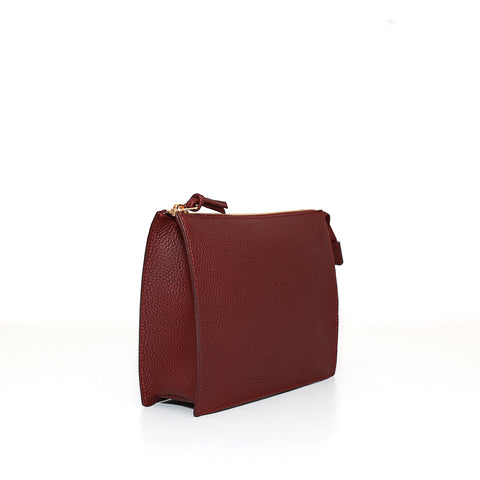 Pocket media in pelle martellata mosto pochette da viaggio e per uso quotidiano, realizzata da Pianigiani Bags.