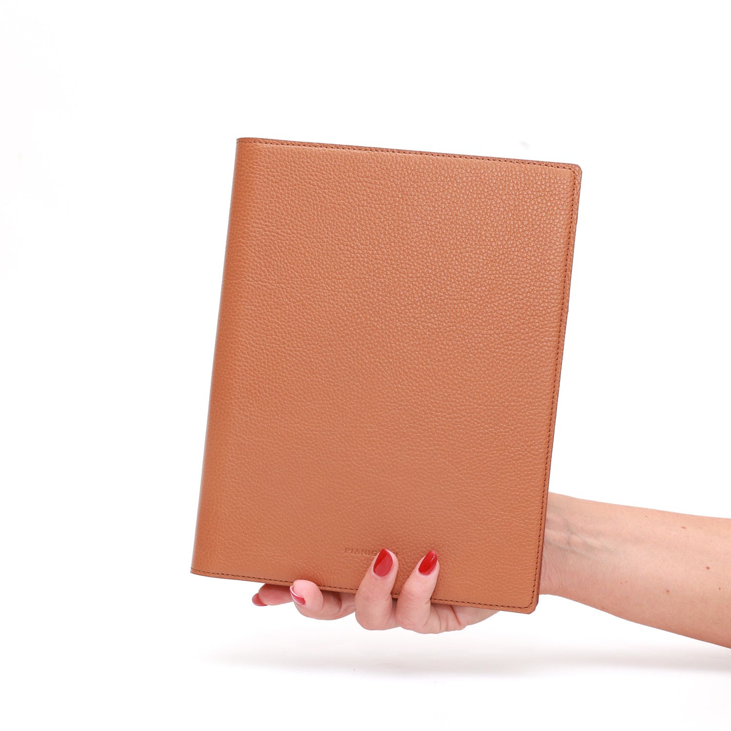 Portablocco formato A5 in pelle martellata caramello. Prodotto a mano da Pianigiani bags