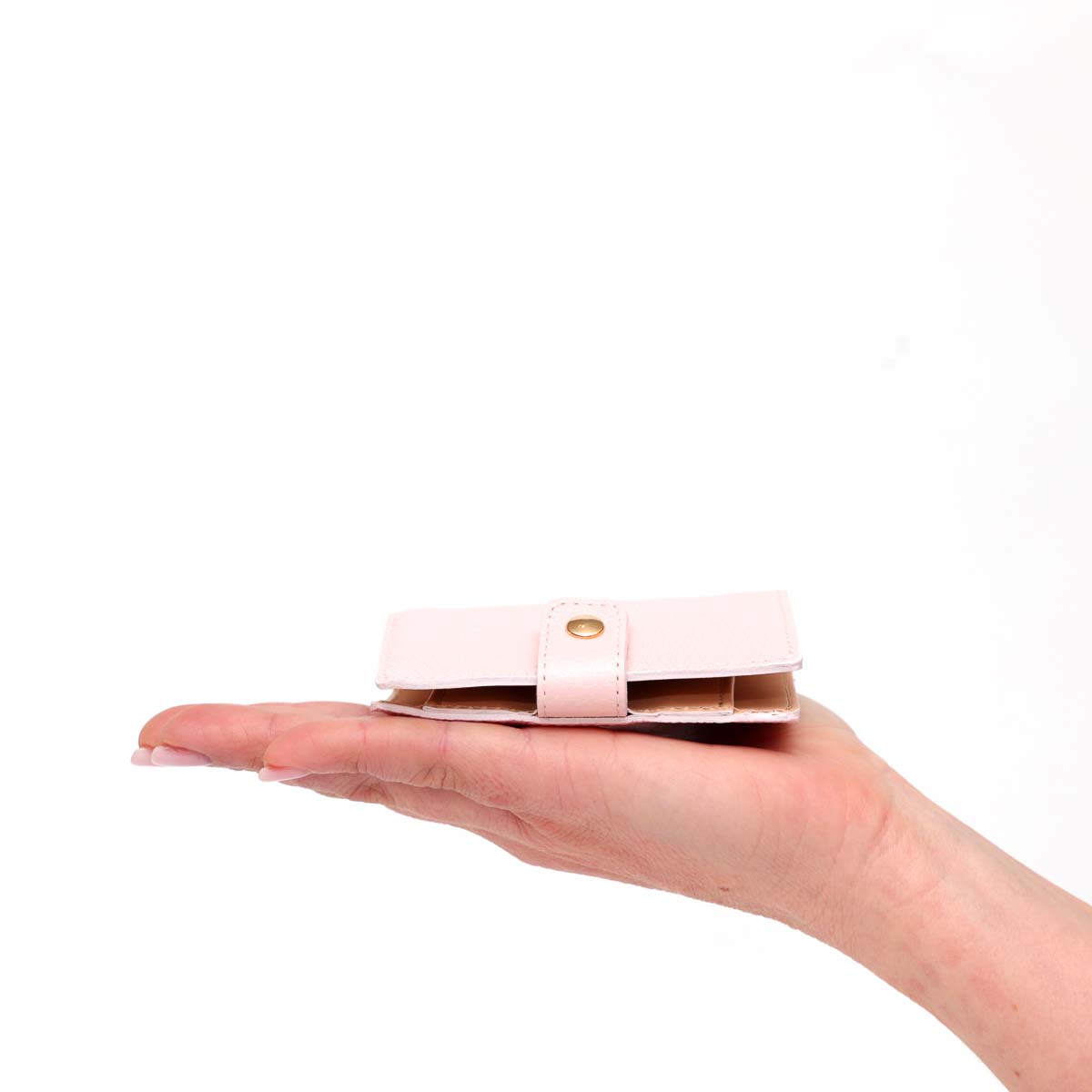 Portafoglio Cara - modello compatto in pelle rosa con tasca per banconote, quattro carte e portamonete, chiusura con clip by Pianigiani