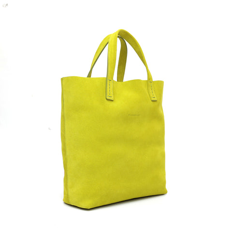 Soft 2.4 piccola, borsa da donna in pelle scamosciata lime, realizzata artigianalmente da Pianigiani Bags.
