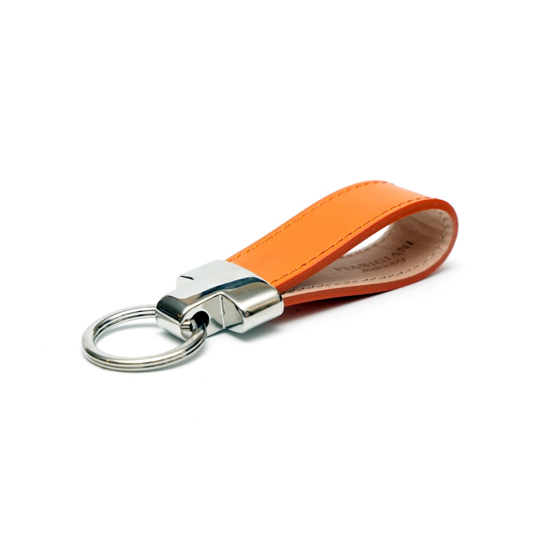 Portachiavi in pelle arancio, realizzato e venduto da Pianigiani Bags